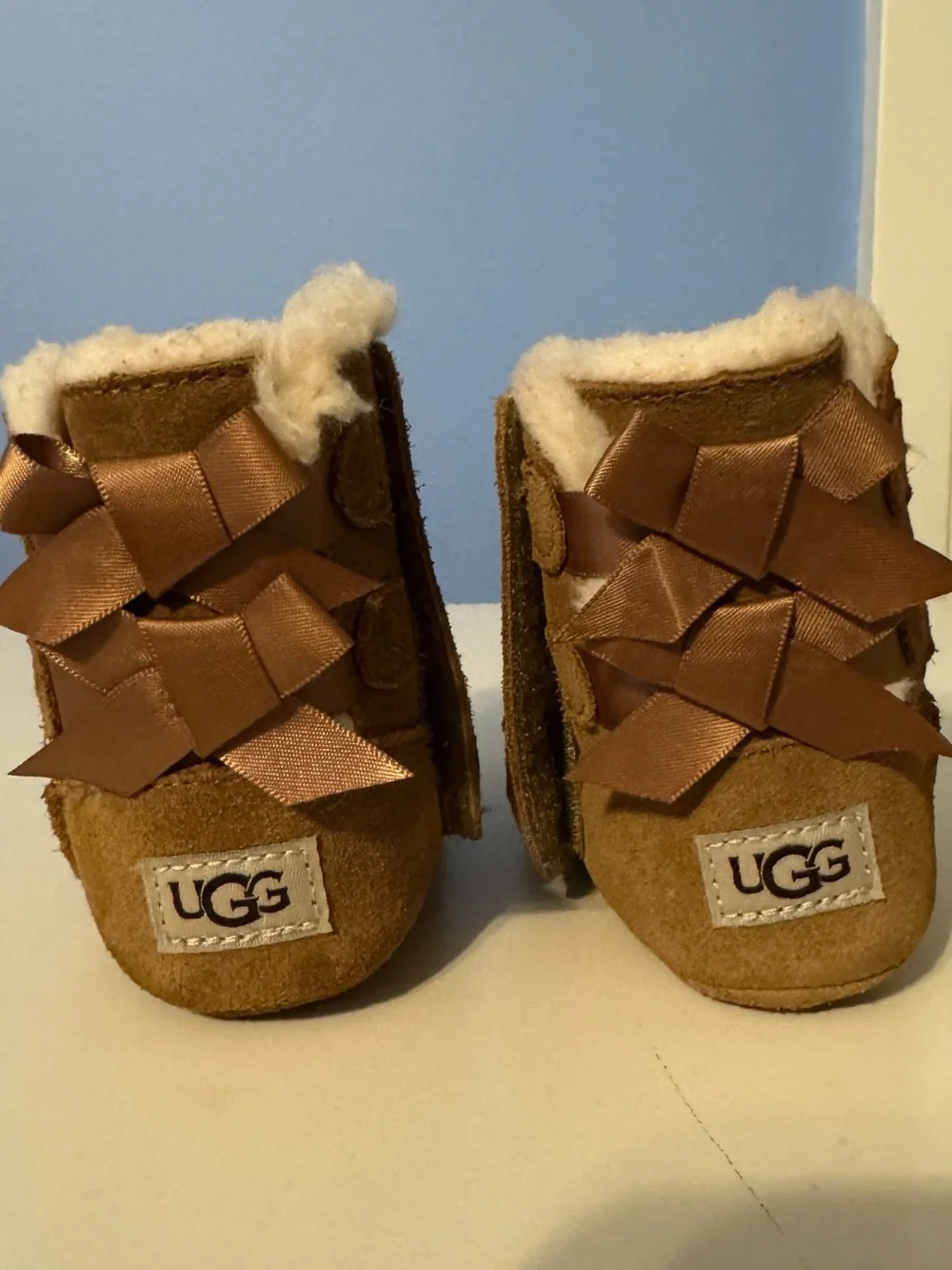 UGG Baby Brown Suede Sheepskin Booties with Ribbon Bows